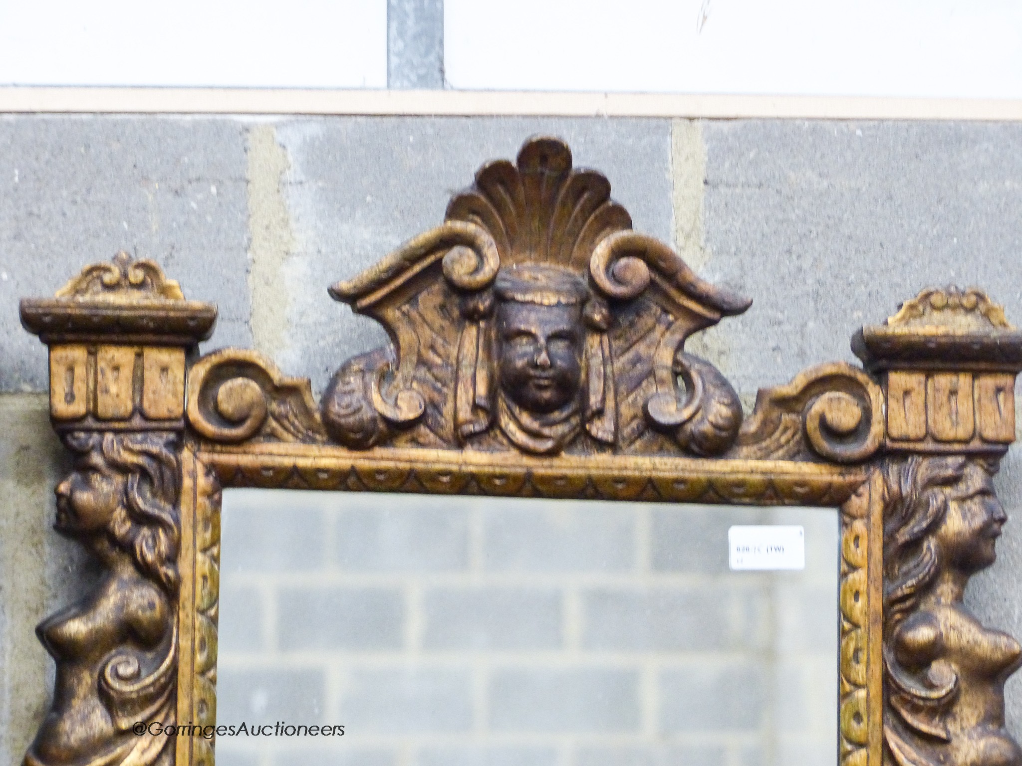 A Renaissance style giltwood wall mirror